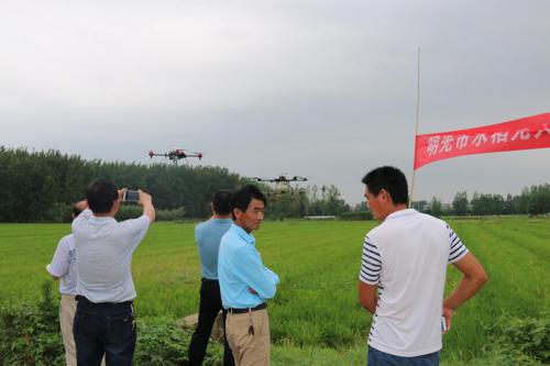明光召开无人机植保现场会